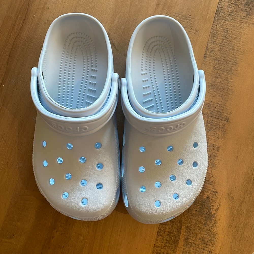 size 9 woman’s 7 men light blue crocs